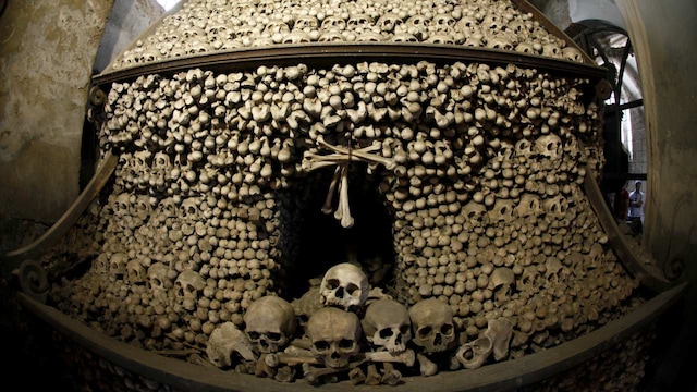 2. The Bone Church, Czech Republic | Named as the Sedlec Ossuary, this church in Kutná Hora displays remains of more than 40,000 people. Skulls are piled in spooky pyramids to create chandeliers, coats of arms, and elaborate wall art made of bones. 2. The Bone Church, Czech Republic | Named as the Sedlec Ossuary, this church in Kutná Hora displays remains of more than 40,000 people. Skulls are piled in spooky pyramids to create chandeliers, coats of arms, and elaborate wall art made of bones.