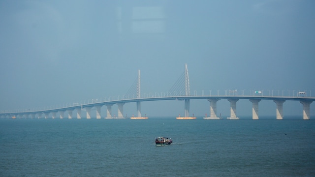 No 3. Engineering Marvel: Hong Kong-Zhuhai-Macau Bridge | Country: China | The Hong Kong-Zhuhai-Macau Bridge is the world’s longest sea crossing, stretching 55 kilometres across the Pearl River Delta. The structure combines bridges, artificial islands, and an undersea tunnel to connect the three cities. Opened in 2018, it is designed to withstand earthquakes and typhoons while cutting journey times dramatically. (Image: Reuters) No 3. Engineering Marvel: Hong Kong-Zhuhai-Macau Bridge | Country: China | The Hong Kong-Zhuhai-Macau Bridge is the world’s longest sea crossing, stretching 55 kilometres across the Pearl River Delta. The structure combines bridges, artificial islands, and an undersea tunnel to connect the three cities. Opened in 2018, it is designed to withstand earthquakes and typhoons while cutting journey times dramatically. (Image: Reuters)