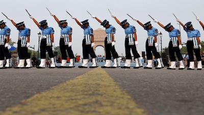 Members of Agniveervayu, Indian Air Force's first-ever all-women drill team, perform in front of India Gate war memorial in New Delhi, India, July 26, 2024. REUTERS/Priyanshu Singh