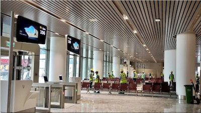 4. Job Creation and Economic Impact | Built for ₹19,650 crore under a public-private partnership between Adani Airport Holdings and CIDCO, NMIA is projected to generate over two lakh jobs across aviation, logistics, IT, hospitality, and real estate sectors. (Image: PTI)