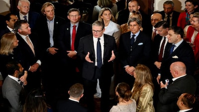 British Prime Minister Keir Starmer speaks with business leaders at the Taj Mahal Palace in Mumbai, India, October 8, 2025. Leon Neal/Pool via REUTERS