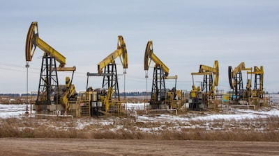 Oil pumping jacks, also known as "nodding donkeys"in a Rosneft Oil Co. oilfield near Sokolovka village, in the Udmurt Republic, Russia, on Friday, Nov. 20, 2020. The flaring coronavirus outbreak will be a key issue for OPEC+ when it meets at the end of the month to decide on whether to delay a planned easing of cuts early next year.