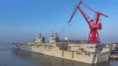 In this photo released by Xinhua News Agency, China's first Type 076 amphibious assault ship, PLANS Sichuan, sets sail from the port of Hudong-Zhonghua Shipbuilding (Group) Co., Ltd. in Shanghai on Friday, Nov. 14, 2025.(Zhang Liang/Xinhua via AP)