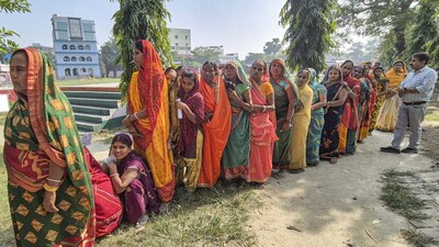Vaishali: Women voters wait in a queue to cast votes at a polling station during the first phase of the Bihar Assembly elections, at Hajipur in Vaishali, Thursday, Nov. 6, 2025. (PTI Photo) (PTI11_06_2025_000355B)