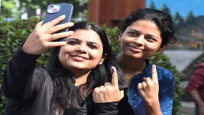 Patna: First-time voters show their fingers marked with indelible ink after casting their votes during the first phase of the Bihar Assembly elections, in Patna, Thursday, Nov. 6, 2025. (PTI Photo)(PTI11_06_2025_000438B)