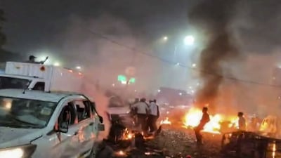 **EDS: SCREENSHOT VIA PTI VIDEOS** New Delhi: Rescue work underway after a blast occurred in a parked car near Red Fort, leaving multiple vehicles in flames, in New Delhi, Monday, Nov. 10, 2025. At least eight people were killed and 24 others suffered injuries in the incident. (PTI Photo)(PTI11_10_2025_000343B)