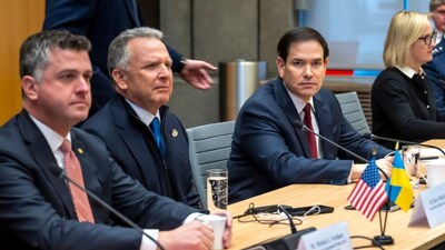 U.S. special envoy Steve Witkoff, second left, and U.S. Secretary of State Marco Rubio, right, sit at the beginning of talks with the Ukrainian delegation at the U.S. Mission to International Organizations in Geneva, Sunday, Nov. 23, 2025. (Martial Trezzini/Keystone via AP)