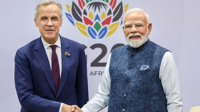 Prime Minister Narendra Modi during a meeting with his Canadian counterpart Mark Carney, on the sidelines of the G20 Leaders' Summit, in Johannesburg, South Africa. (PMO via PTI Photo) (PTI11_23_2025_000402B)