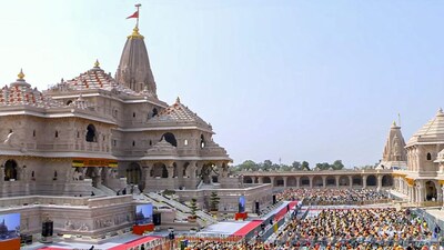 **EDS: THIRD PARTY IMAGE** In this image received on Nov. 25, 2025, People attend the Dhwajarohan ceremony at the Ram Temple, in Ayodhya, Uttar Pradesh. The ceremony was graced by Prime Minister Narendra Modi and RSS chief Mohan Bhagwat in Ayodhya, Uttar Pradesh. (@NarendraModi/YT via PTI Photo)(PTI11_25_2025_000185B)