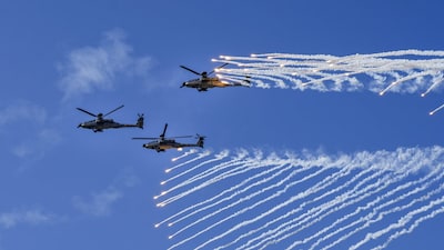 Guwahati: IAF's Apache helicopters perform manoeuvres during an air show marking the 93rd anniversary celebrations, at Lachit Ghat over the Brahmaputra river, in Guwahati, Sunday, Nov. 9, 2025. (PTI Photo/Arun Sharma)(PTI11_09_2025_000187B)