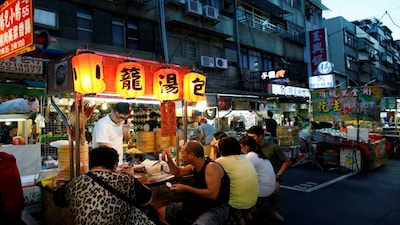 Taiwan | Taiwan is best known for its night markets, which showcase a broad range of street food. Bubble tea, fried chicken, oyster omelettes and tofu-based dishes are among the most popular. The night market culture has become a major tourist draw.(Image: Reuters)