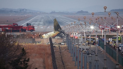 The wreckage of the Jeju Air aircraft that went off the runway and crashed lies at Muan International Airport, in Muan, South Korea, December 30, 2024. REUTERS/Kim Hong-Ji
