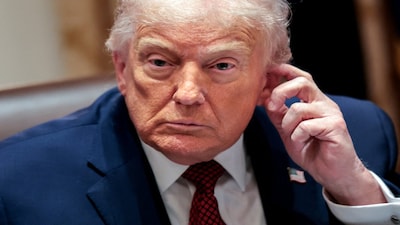 U.S. President Donald Trump attends a roundtable discussion on the day he announced an aid package for farmers, at the White House in Washington, D.C., U.S., December 8, 2025. REUTERS/Jonathan Ernst