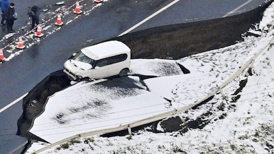 Photo taken from a Kyodo News airplane on December 9, 2025, shows a collapsed road in Tohoku in Aomori Prefecture, northeastern Japan, following a strong earthquake that struck the region the previous night in this photo taken by Kyodo. Mandatory credit Kyodo/via REUTERS ATTENTION EDITORS - THIS IMAGE WAS PROVIDED BY A THIRD PARTY. EDITORIAL USE ONLY. MANDATORY CREDIT. JAPAN OUT. NO COMMERCIAL OR EDITORIAL SALES IN JAPAN. TPX IMAGES OF THE DAY