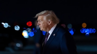 President Donald Trump arrives on Air Force One at Palm Beach International Airport, Saturday, Dec. 20, 2025, in West Palm Beach, Fla. (AP Photo/Alex Brandon)