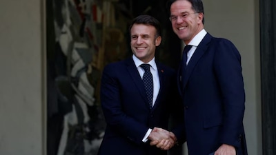 French President Emmanuel Macron welcomes NATO Secretary General Mark Rutte (Reuters)