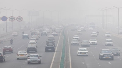 Traffic moves along a highway amidst air pollution in New Delhi, India, December 18, 2025. REUTERS/Adnan Abidi