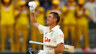 Australia's Marnus Labuschagne celebrates after Australia won the first Ashes cricket test match against England in Perth, Saturday, Nov. 22, 2025.(AP Photo/Gary Day)