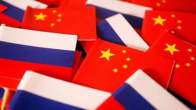 Flags of China and Russia are displayed in this illustration picture taken March 24, 2022. REUTERS/Florence Lo/Illustration
