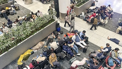 **EDS: BEST QUALITY AVAILABLE** New Delhi: Stranded passengers at Indira Gandhi International Airport, in New Delhi, Friday, Dec. 5, 2025. Passengers were left stranded as IndiGo cancelled numerous flights while struggling to meet new crew rostering rules, a day after it scrapped several services and announced schedule adjustments. (PTI Photo)(PTI12_05_2025_000019B)