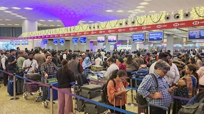 Mumbai: Stranded passengers at the IndiGo counter after several flights were cancelled at Chhatrapati Shivaji Maharaj International Airport, in Mumbai, Friday, Dec. 5, 2025. (PTI Photo)(PTI12_05_2025_000020B)