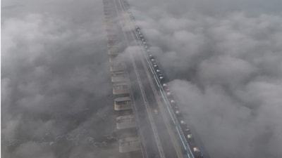 A layer of fog shrouds the Ganga Barrage on a cold and winter morning, in Kanpur, Tuesday, Dec. 23, 2025. (PTI Photo)