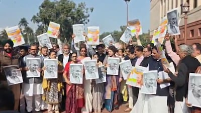 Opposition MPs protest in Parliament on December 16, on removal of Mahatma Gandhi's name from rural employment Bill. (Screengrab) 