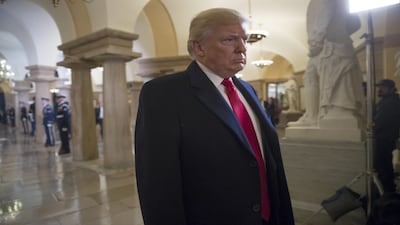 President-elect Donald Trump walks through the Crypt at the Capitol to his inauguration ceremony in Washington, Friday, Jan. 20, 2017. Trump, a real estate mogul and reality television star who upended American politics and energized voters angry with Washington, will be sworn in as the 45th president of the United States, putting Republicans in control of the White House for the first time in eight years. l)