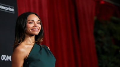 Cast member Zoe Saldana attends the premiere for the film 'Avatar: Fire and Ash', in Los Angeles, California, U.S., December 1, 2025. REUTERS/Mario Anzuoni