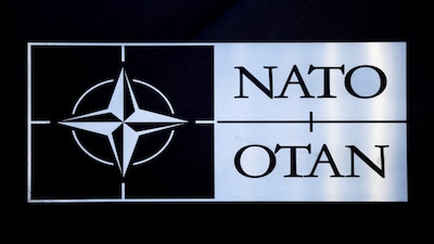 FILE PHOTO: The logo of NATO is seen at a meeting of the North Atlantic Council in the NATO defence ministers' session together with Sweden as the invitee, at the Alliance's headquarters in Brussels, Belgium February 15, 2024. REUTERS/Johanna Geron/File Photo