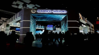 FILE PHOTO: FILE PHOTO: People visit Maruti Suzuki stand at India's five-day auto show in New Delhi, India, January 18, 2025. REUTERS/Priyanshu Singh/File Photo/File Photo