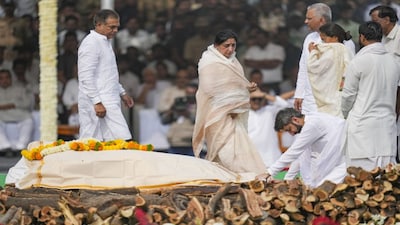 Pune: Maharashtra Deputy Chief Minister Ajit Pawar's son Jay Pawar mourns near his father's mortal remains as his mother Sunetra Pawar looks on during Ajit Pawar's funeral, at Baramati in Pune district, Thursday, Jan. 29, 2026. (PTI Photo/Kunal Patil)(PTI01_29_2026_000160B)