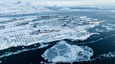 FILE - Houses covered by snow are seen on the coast of a sea inlet of Nuuk, Greenland, on  March 7, 2025. (AP Photo/Evgeniy Maloletka, File)