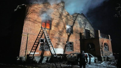 A residential building burns after a Russian strike in Kyiv, Ukraine. (AP)