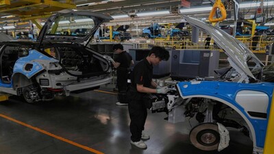 FILE - Workers assemble the Zeekr 001 EV models at the Chinese automaker Zeekr assembly plant in Ningbo, east China's Zhejiang Province, April 17, 2025. (AP Photo/Andy Wong, File)