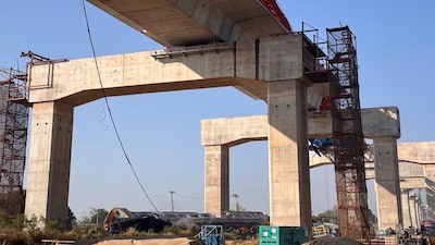 This photo provided by State Railway of Thailand shows a scene after a construction crane fell into a passenger train in Nakhon Ratchasima province, Thailand Wednesday, Jan. 14, 2026. (State Railway of Thailand via AP)