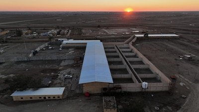 An aerial view shows Shaddadeh prison complex in the town of Shaddadeh, northeastern Syria, Tuesday, Jan. 20, 2026, a day after Syria's Interior Ministry said Islamic State group members escaped from the facility during clashes with the Kurdish-led Syrian Democratic Forces. (AP Photo/Ghaith Alsayed)