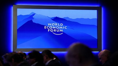 The World Economic Forum (WEF) logo is displayed as people attend the 56th annual World Economic Forum (WEF) meeting in Davos, Switzerland, January 20, 2026. REUTERS/Denis Balibouse