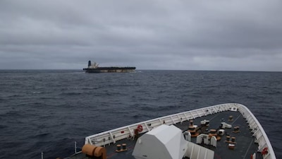 A handout image of the ship Marinera (Ex-Bella 1) seen in the distance, released on January 7, 2026. US EUROPEAN COMMAND via X/Handout via REUTERS