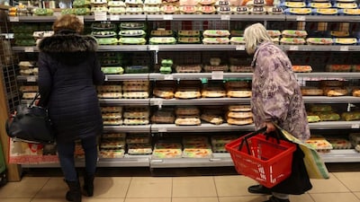 Customers shop at a supermarket in Budapest, Hungary, March 17, 2025. REUTERS