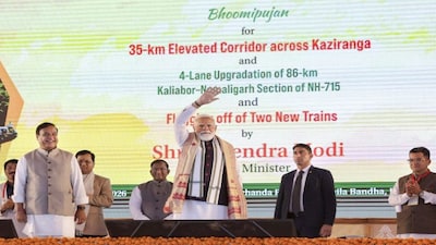**EDS: THIRD PARTY IMAGE** In this image posted on Jan. 18, 2026, Prime Minister Narendra Modi with Assam Governor Lakshman Prasad Acharya, Union Minister Sarbananda Sonowal and Chief Minister Himanta Biswa Sarma during the foundation stone laying ceremony for the Kaziranga Elevated Corridor, at Kaliabor, in Nagaon district, Assam. (@narendramodi/X via PTI Photo)(PTI01_18_2026_000367B)