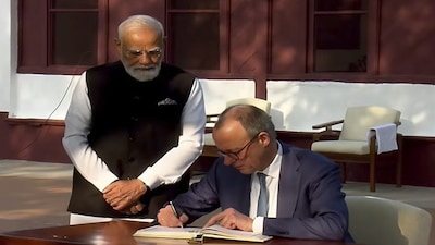 **EDS: THIRD PARTY IMAGE** In this screengrab from a video posted on Jan. 12, 2026, Prime Minister Narendra Modi and German Chancellor Friedrich Merz visit Sabarmati Ashram during the German leader's maiden India trip, in Ahmedabad. (@NarendraModi/YT via PTI Photo)(PTI01_12_2026_000040B)