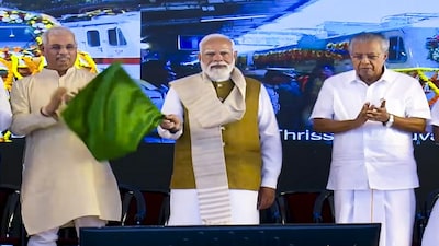 **EDS: THIRD PARTY IMAGE** In this screengrab from a video posted on Jan. 23, 2026, Prime Minister Narendra Modi, centre, Kerala Governor Rajendra Arlekar, left, and Chief Minister Pinarayi Vijayan during the launch of various developmental projects and flagging off of new train services, in Thiruvananthapuram. (@NarendraModi/YT via PTI Photo) (PTI01_23_2026_000051B)
