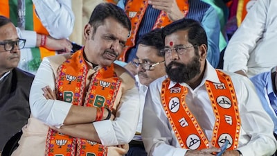 Maharashtra CM and BJP leader Devendra Fadnavis (left) with Eknath Shinde of Shiv Sena 