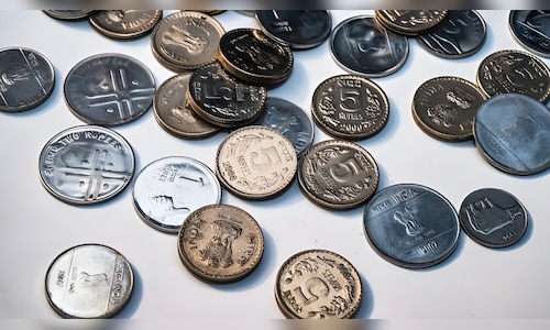 Rupee recovers from lowest level, gains 9 paise to 91.90 against US dollar