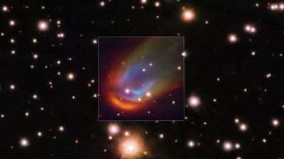 The central square image, taken with the MUSE instrument on ESO's Very Large Telescope, shows shock waves around the dead star RXJ0528+2838. When a star moves through space it can push away nearby material creating a so-called bow shock, which in this image is glowing in red, green and blue. The colours represent hydrogen, nitrogen and oxygen, respectively. These shocks are usually produced by a strong outflow expelled from the star. However, in the case of RXJ0528+2838 –– a white dwarf with a Sun-like companion –– astronomers discovered that the shock wave can’t be explained by any known mechanism. Some hidden energy source, perhaps magnetic fields, could be the answer to this mystery.    European Southern Observatory (ESO)/K. Ilkiewicz and S. Scaringi et al./Handout via REUTERS    THIS IMAGE HAS BEEN SUPPLIED BY A THIRD PARTY. MANDATORY CREDIT. NO RESALES. NO ARCHIVES. OVERLAY FROM SOURCE.