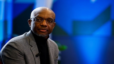 James Manyika, SVP of Research, Technology and Society at Google delivers a speech during a media reception at the Google France headquarters ahead of the Artificial Intelligence Action Summit in Paris, France, February 9, 2025. REUTERS/Gonzalo Fuentes