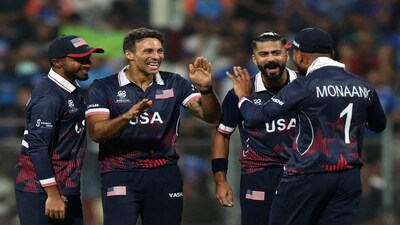 Cricket - ICC Men's T20 World Cup 2026 - Group A - India v United States - Wankhede Stadium, Mumbai, India - February 7, 2026 Shadley van Schalkwyk of the U.S. celebrates with teammates after dismissing India's Shivam Dube REUTERS/Francis Mascarenhas