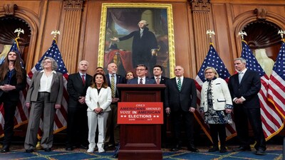 Speaker of the House Mike Johnson (R-LA), flanked by House Republican leadership and activists, speaks during a press conference after the Republican-controlled House of Representatives passed a bill requiring proof of U.S. citizenship to register to vote and when voting, ahead of the November midterm elections, on Capitol Hill in Washington, D.C., U.S., February 11, 2026. REUTERS/Kent Nishimura