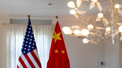 The U.S. and Chinese flags are seen on the day of a bilateral meeting between the U.S. and China, in Geneva, Switzerland, May 10, 2025. KEYSTONE/EDA/Martial Trezzini/Handout via REUTERS